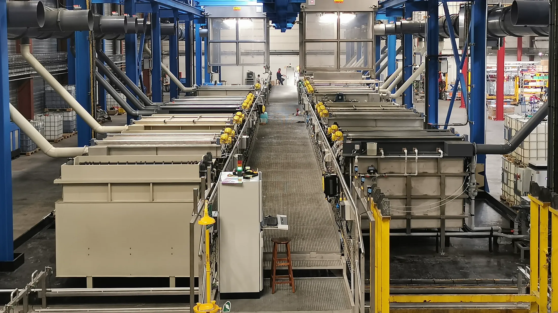Our fully automated and robotic production line. This overview illustrates the efficiency of our process, where automated systems and robots ensure precision and consistency at every step of production. Our commitment to automation strengthens our ability to provide high-quality surface treatment solutions efficiently.