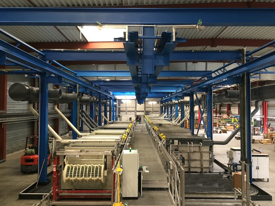 Our fully automated and robotic production line. This overview illustrates the efficiency of our process, where automated systems and robots ensure precision and consistency at every step of production. Our commitment to automation strengthens our ability to provide high-quality surface treatment solutions efficiently.